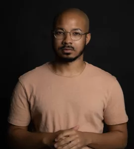 Jaylen Bledsoe headshot, black background