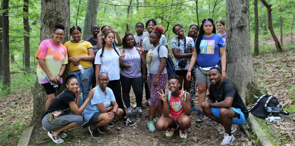 group of teens smiling for the camera