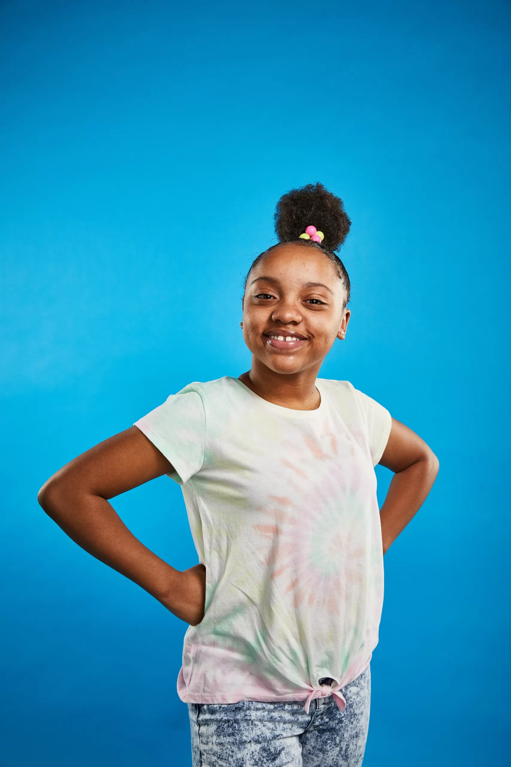 a young woman smiling at the camera