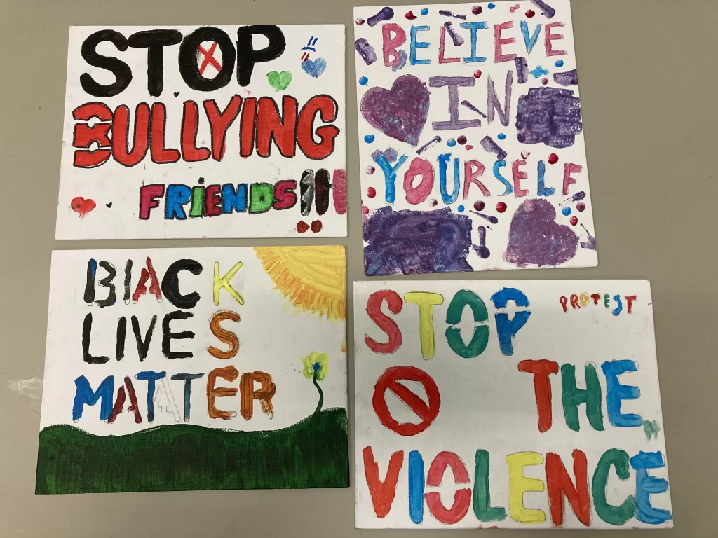 signs created by teens for community service