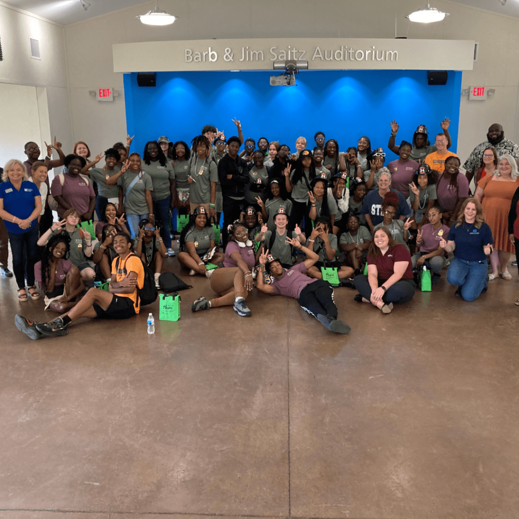 group of teens at career day smiling